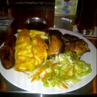 Photo taken at Janelle&amp;#39;s Caribbean American Cuisine &amp;amp; Bar by Miss B. on 6/15/2012