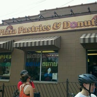 Photo taken at Plaza Pastries &amp;amp; Donuts by Greg J. on 4/15/2012