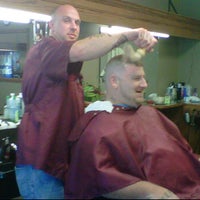 Photo taken at Mike&amp;#39;s Barbershop by Heather R. on 6/30/2011