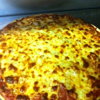 Photo taken at Angelo&amp;#39;s Pizza by Amanda F. on 5/6/2012