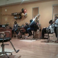 Photo taken at Atmosphere Hair Salon by Jakita C. on 11/24/2011
