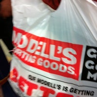 Photo taken at Modell&amp;#39;s Sporting Goods by Patrick F. on 3/20/2012
