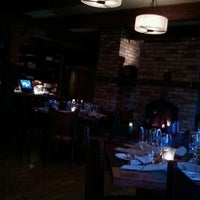 Photo taken at Restaurant La Petite Cachée by Gregory P. on 3/17/2012