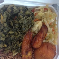 Photo taken at Ackee Bamboo Jamaican Cuisine by Tonya M. on 5/4/2012