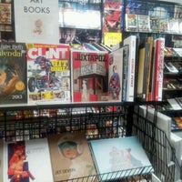 Photo taken at Earth 2 Comics by Ginny H. on 8/14/2012
