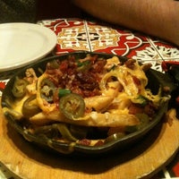 Photo taken at Chili&amp;#39;s Grill &amp;amp; Bar by L C. on 1/9/2012