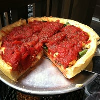 Photo taken at Pi Pizzeria by Heather P. on 4/15/2012