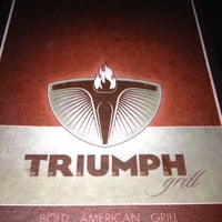 Photo taken at Triumph Grill by christi c. on 6/6/2012