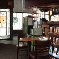 Photo taken at Starbucks by Georgina B. on 4/22/2012