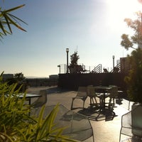 Photo taken at Renaissance Tower Roof Top Pool Deck by Joe C. on 7/15/2012