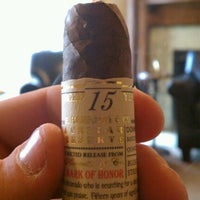 Photo taken at Crossroads Cigars by Nick C. on 7/8/2012