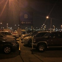 Photo taken at Parking Lot F by Aaron B. on 3/21/2012