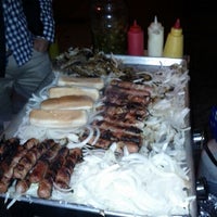 Photo taken at Bacon-Wrapped Hot Dog Cart by Karen O. on 3/24/2012