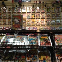 Photo taken at Earth2Comics by Sassy L. on 6/13/2012