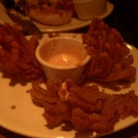 Photo taken at Outback Steakhouse by Jose A. on 1/1/2012
