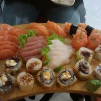 Photo taken at Kyuden Sushi by Juliana B. on 9/15/2011
