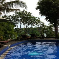 Photo taken at Mushroom Beach Bungalows by ,7TOMA™®🇸🇬 S. on 6/10/2012
