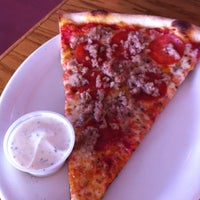 Photo taken at Mia&amp;#39;s Pizza &amp;amp; Eats by Adam W. on 7/29/2011