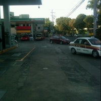 Photo taken at Gasolinera Tlalpan by Marco Vinicio F. on 6/11/2012