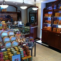 Photo taken at Godiva Chocolatier by ALI A. on 5/27/2012