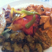 Photo taken at Ganesha Indian Cuisine Sweets &amp;amp; Catering by Alejandro M. on 8/23/2011