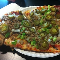 Photo taken at The Flying Pizza by Laura E. on 6/15/2012