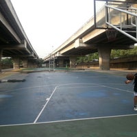 Photo taken at Basketball Court (under the highway) by Lebron M. on 7/10/2012