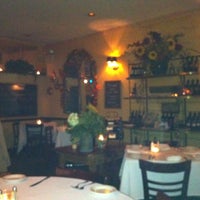 Photo taken at Tuscany Grill by William C. on 10/27/2011