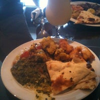 Photo taken at Sitara Indian Restaurant by Aaron F. on 7/21/2011