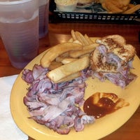 Photo taken at Slim&amp;#39;s Bar-B-Q &amp;amp; Grill by Ted Y. on 12/30/2011