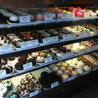 Photo taken at Crumbs Bake Shop by Sae P. on 2/22/2012