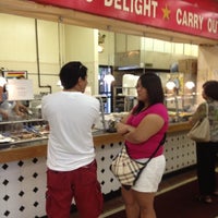 Photo taken at Uni-Mart One Stop Shopping by Lester on 8/6/2012