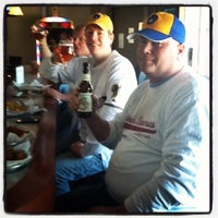Photo taken at Sauced Sports Bar and Pizzeria by Annie H. on 4/6/2012