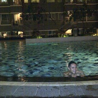 Photo taken at Poolside Tower A - Sudirman Park Apartment by tammy c. on 5/25/2012