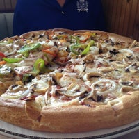 Photo taken at Miltonian Pizzeria by Deborah on 7/8/2012