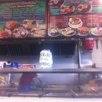 Photo taken at Los Burritos Meat Market by Ramiro L. on 6/18/2012