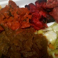 Photo taken at Wazwan Indian Cuisine by Tracy N. on 5/12/2012