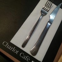 Foto diambil di Charlot Café oleh Ferran F. pada 6/28/2012