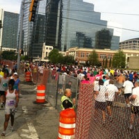 Photo taken at Peachtree Road Race Finish Line by Drewski G. on 7/4/2012