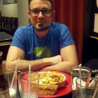 Photo taken at Stone Hearth Pizza by Kelle S. on 4/25/2012
