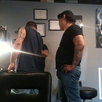 Photo taken at Rebellion Tattoo by Jacky A. on 3/25/2012