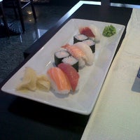 Photo taken at Wok Restaurant by Gina D. on 4/18/2012