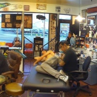 Photo taken at Big Daddy&amp;#39;s Tattoo by Leslie C. on 2/18/2011