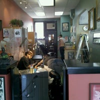 Photo taken at Slave to the Needle Tattoo by Michelle C. on 8/5/2012