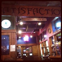 Photo taken at Satisfaction Restaurant &amp;amp; Bar by Chris G. on 1/30/2012