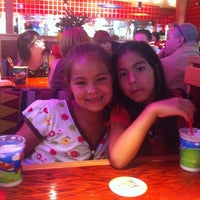 Photo taken at Red Robin Gourmet Burgers and Brews by Chris A. on 6/26/2011