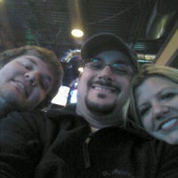 Photo taken at The Greene Turtle Sports Bar &amp; Grille by Eric R. on 12/31/2011