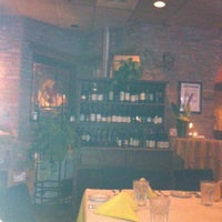 Photo taken at French Market Bistro by Angela R. on 8/17/2012