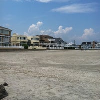 Photo taken at Confederate Beach by George L. on 7/23/2012