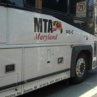 Photo taken at MTA Maryland Commuter Bus stop by Carlos J. S. on 8/2/2012